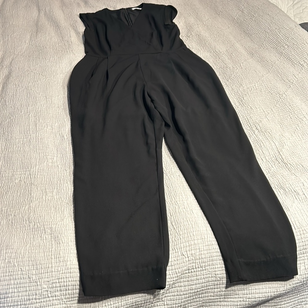 Jennifer Lopez black pants suit